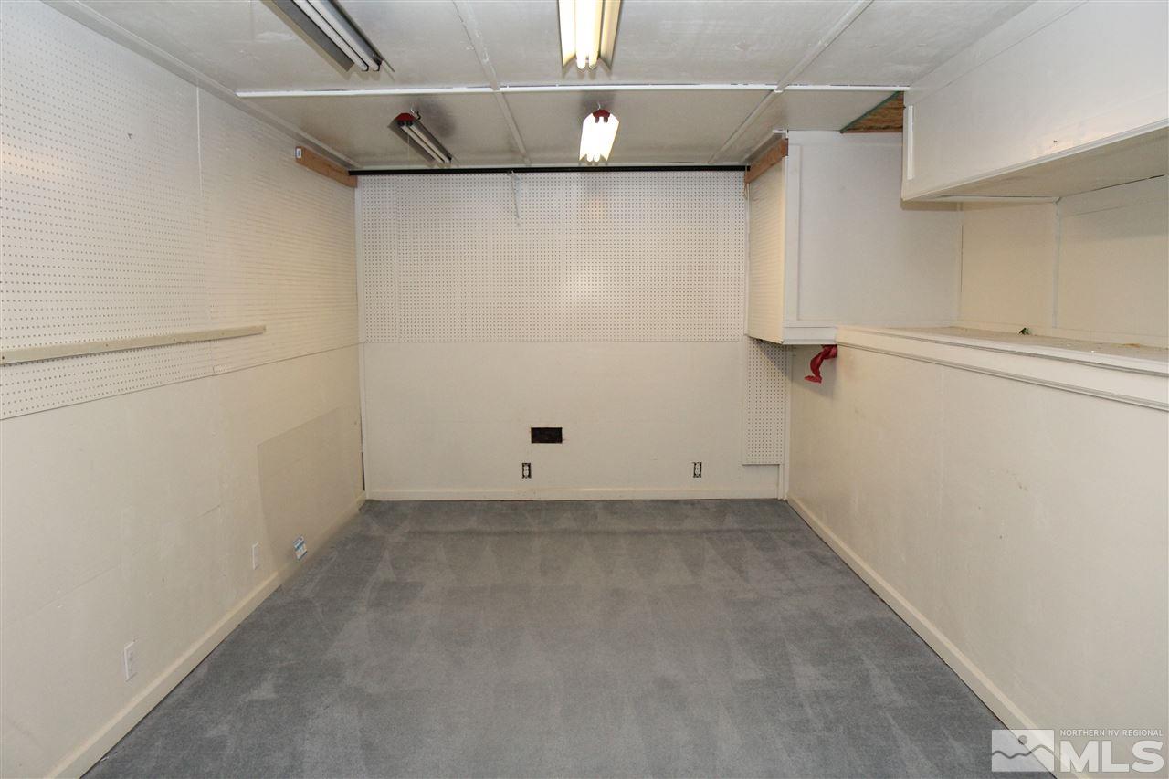 14170 Rim Rock Drive Reno, NV 89521 - Photo 21 of 25 a view of a room with racks on the wall