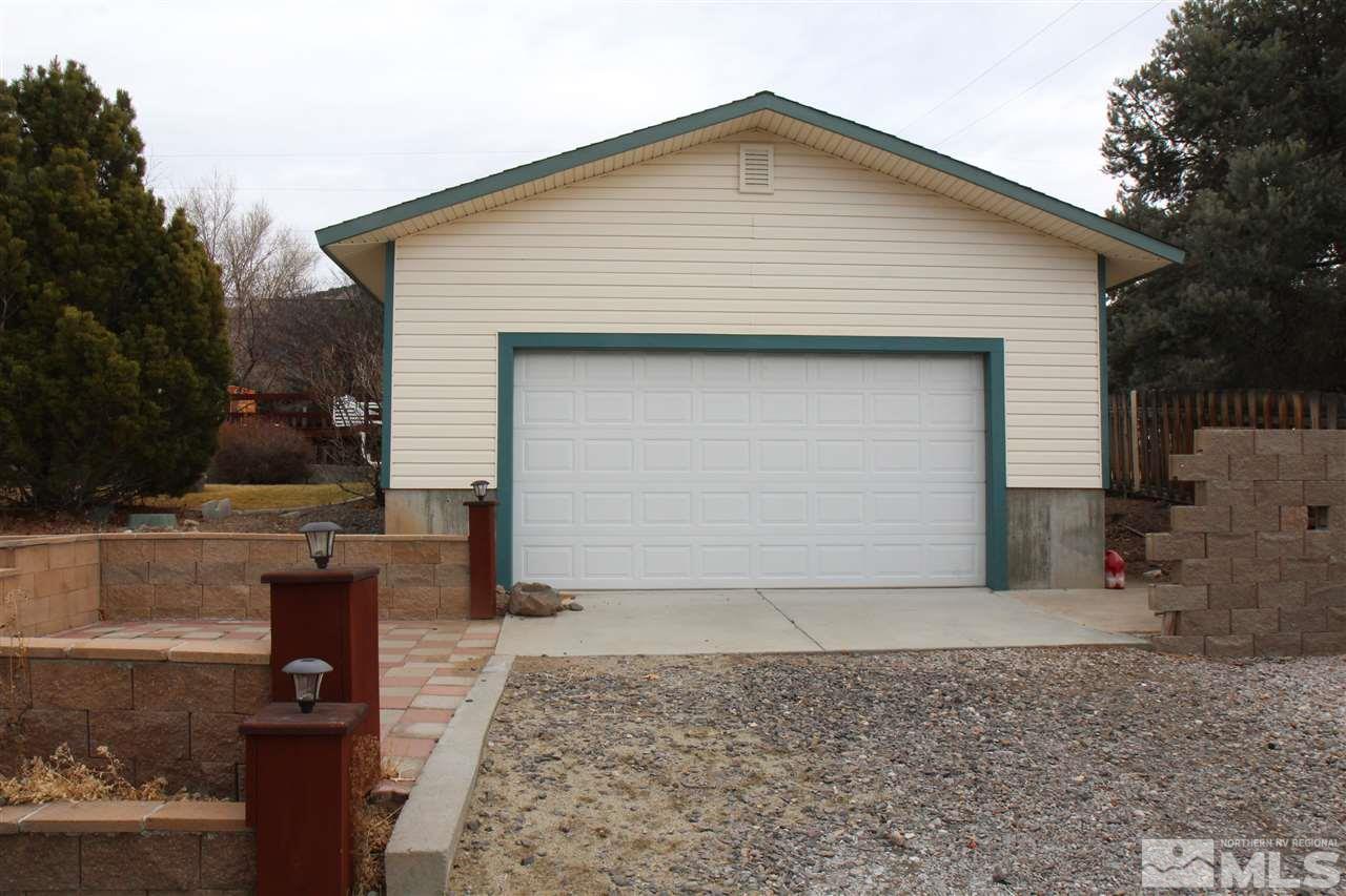 14170 Rim Rock Drive Reno, NV 89521 - Photo 3 of 25 a front view of a house with garage