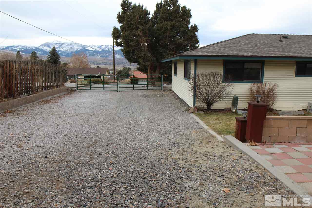 14170 Rim Rock Drive Reno, NV 89521 - Photo 4 of 25 a view of a house with a patio