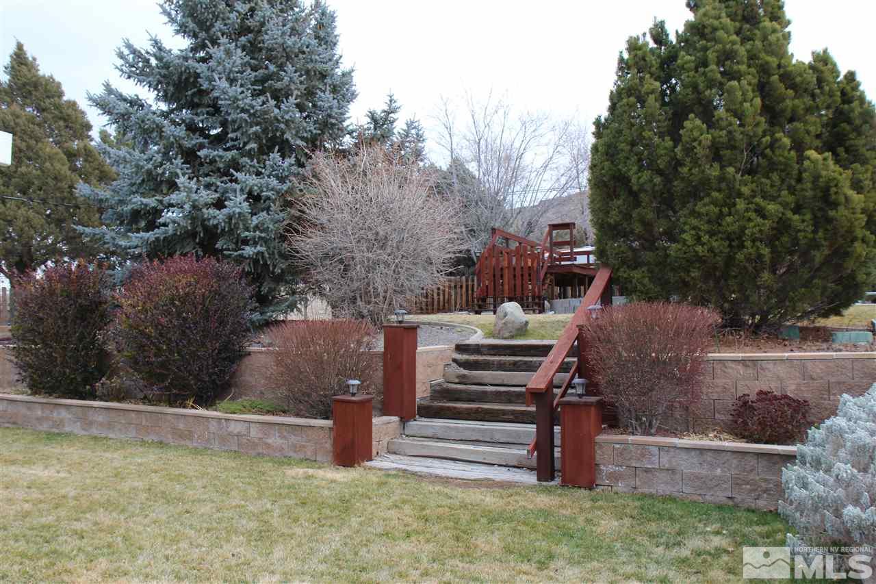 14170 Rim Rock Drive Reno, NV 89521 - Photo 5 of 25 a view of a backyard with swimming pool