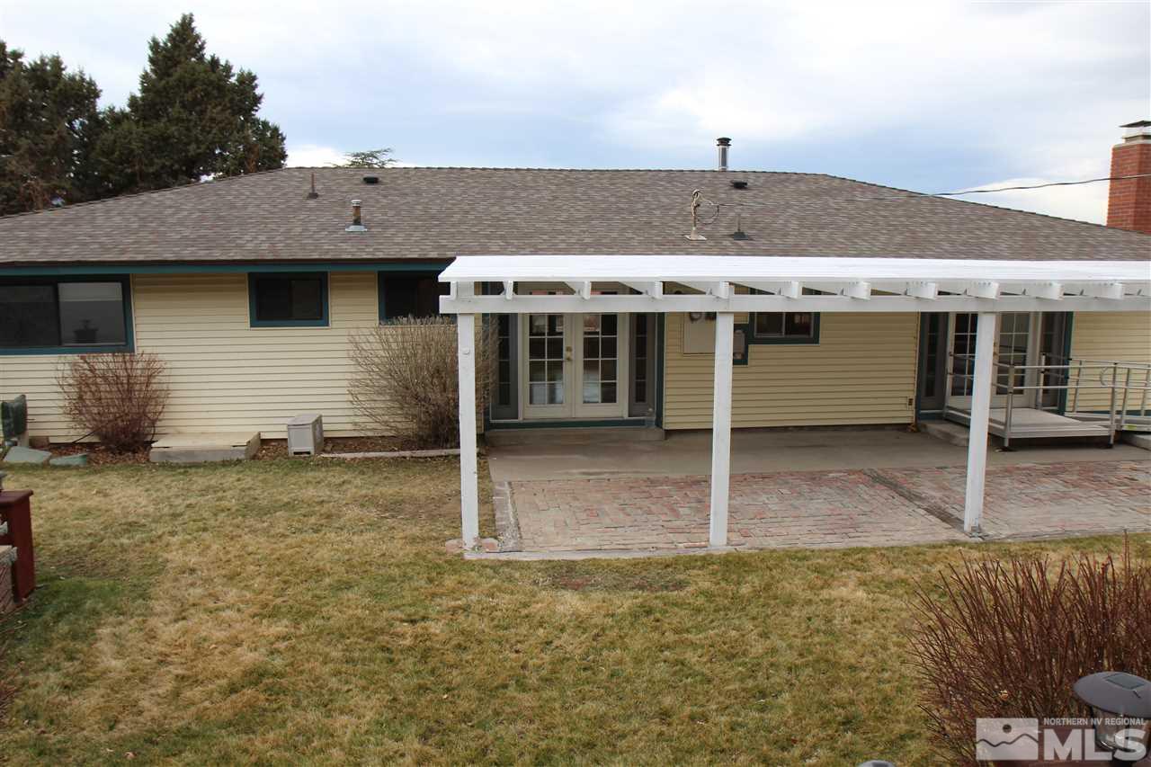 14170 Rim Rock Drive Reno, NV 89521 - Photo 6 of 25 a view of a white house with large space
