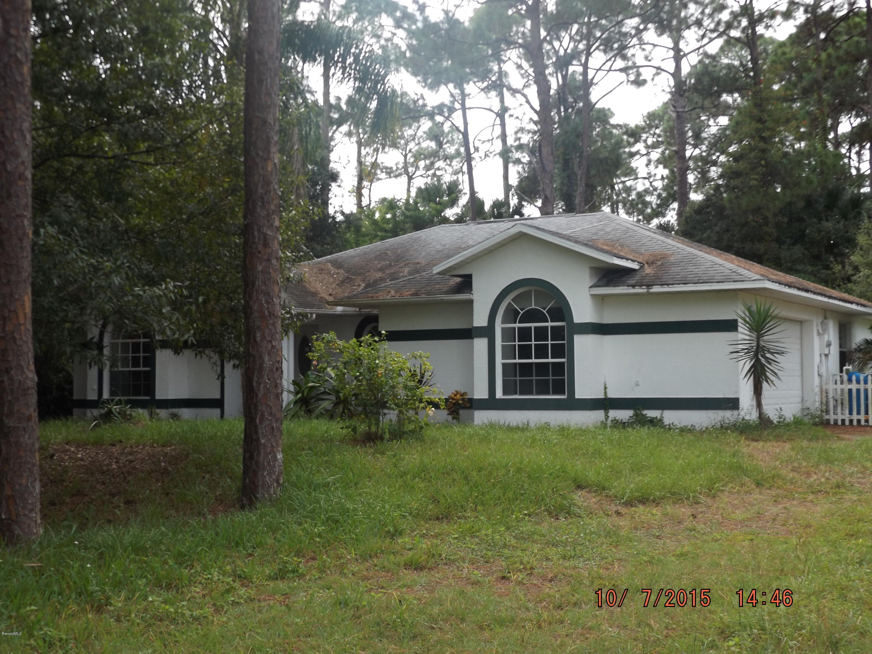 285 Northwest Valencia Road Melbourne, FL 32904 - Photo 1 of 15 Front View
