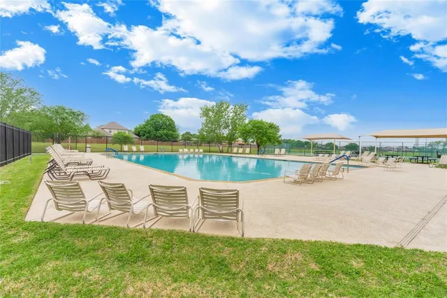 a view of a lake with a garden