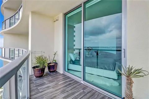 a view of a hallway with a potted plant