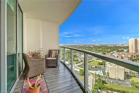 a view of roof deck with furniture