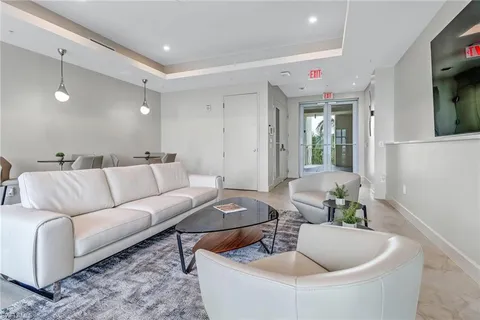 a living room with furniture and a couch