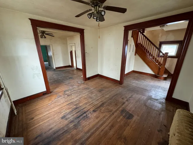 a view of a hallway view with staircase