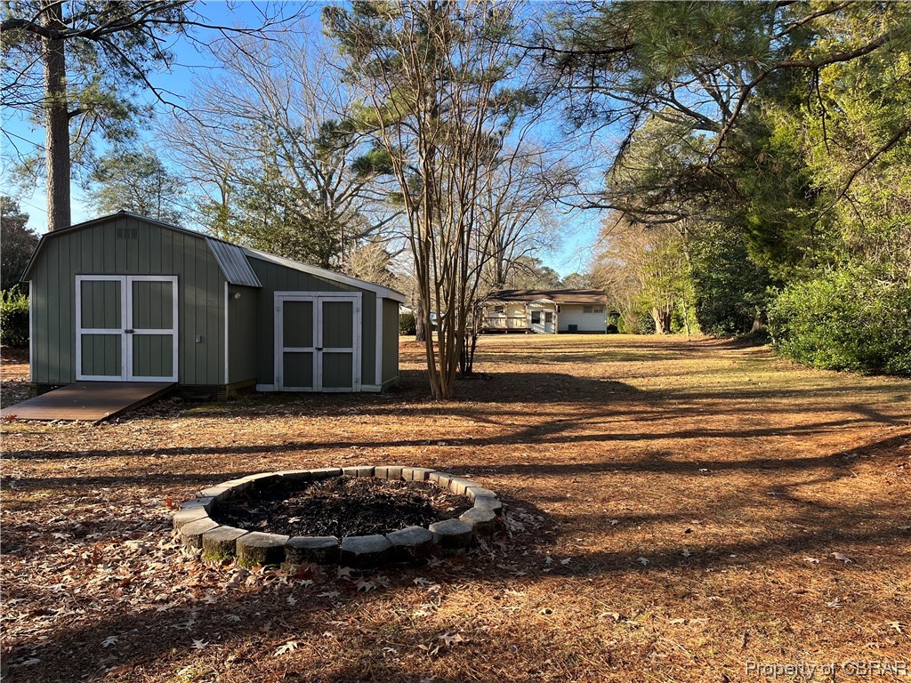 1489 Laurens Road Gloucester Point, VA 23062 - Photo 6 of 43 View of yard featuring a shed