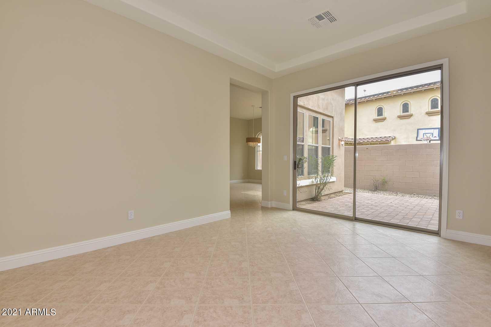 20430 West Springfield Street Buckeye, AZ 85396 - Photo 23 of 58 Dining Room-Side Courtyard