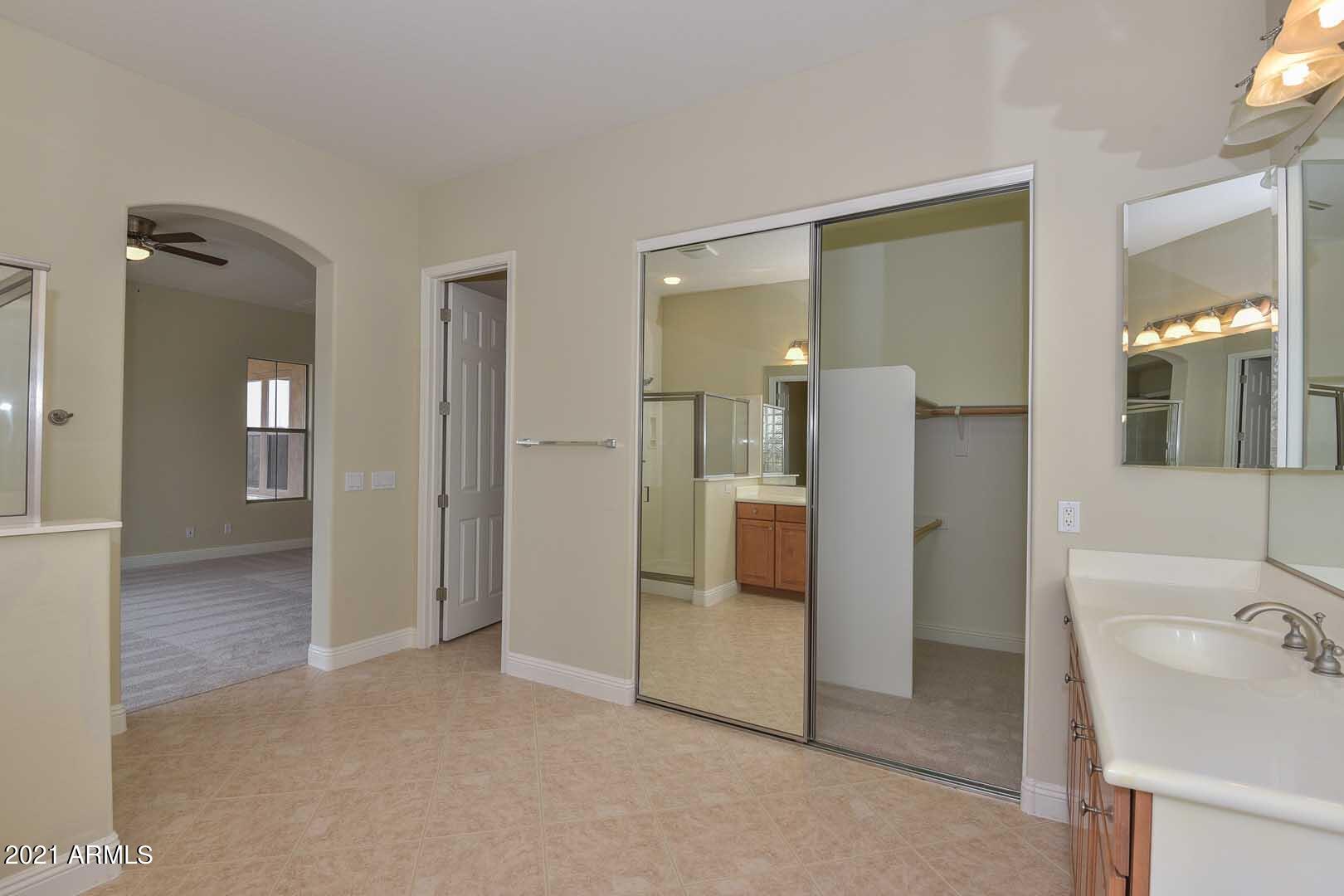 20430 West Springfield Street Buckeye, AZ 85396 - Photo 36 of 58 Master Bath-Walk in Closet