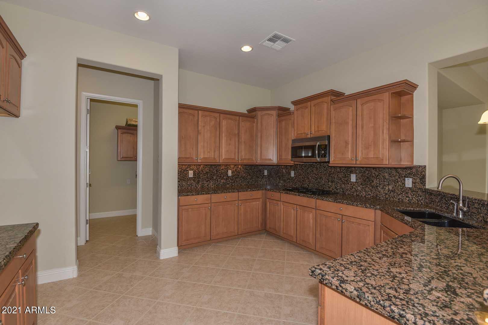 20430 West Springfield Street Buckeye, AZ 85396 - Photo 10 of 58 Kitchen