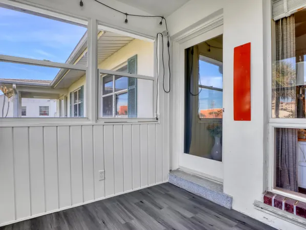 a view of front door and bedroom