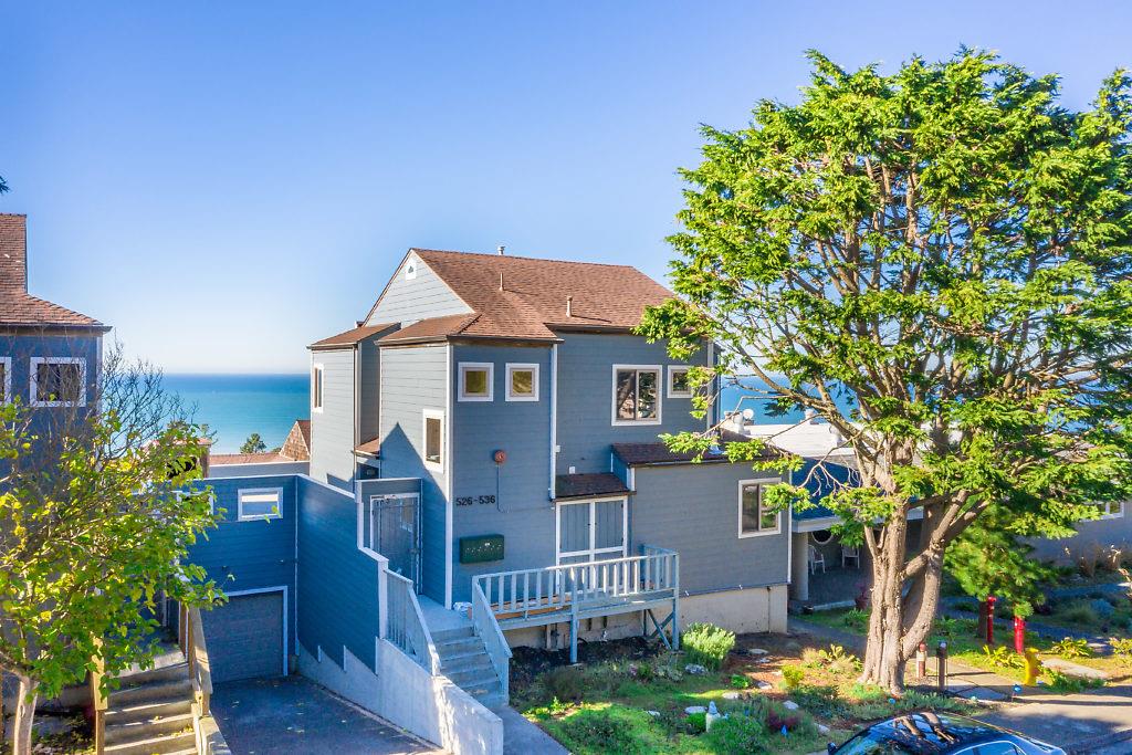 532 Monterey Road Pacifica, CA 94044 - Photo 25 of 41 a front view of a house with a yard