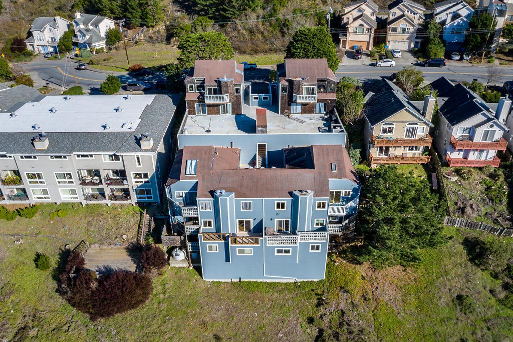 532 Monterey Road Pacifica, CA 94044 - Photo 27 of 41 an aerial view of residential houses with outdoor space and swimming pool