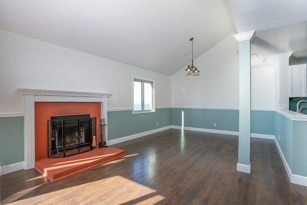 532 Monterey Road Pacifica, CA 94044 - Photo 8 of 41 a view of livingroom with fireplace and wooden floor