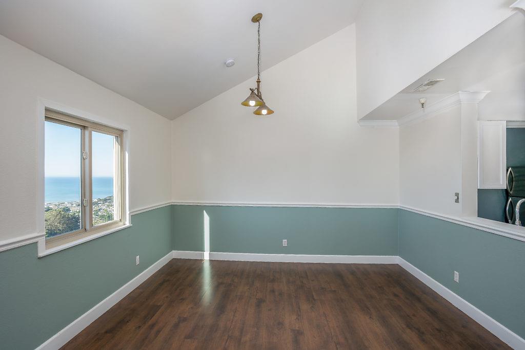 532 Monterey Road Pacifica, CA 94044 - Photo 9 of 41 a view of a room with wooden floor and fan