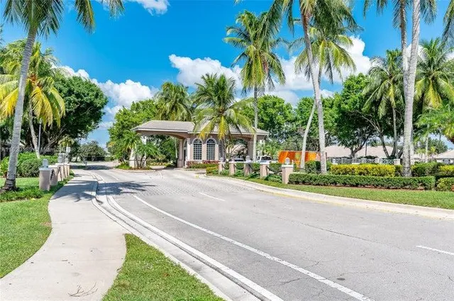 a view of a swimming pool with an outdoor space and seating