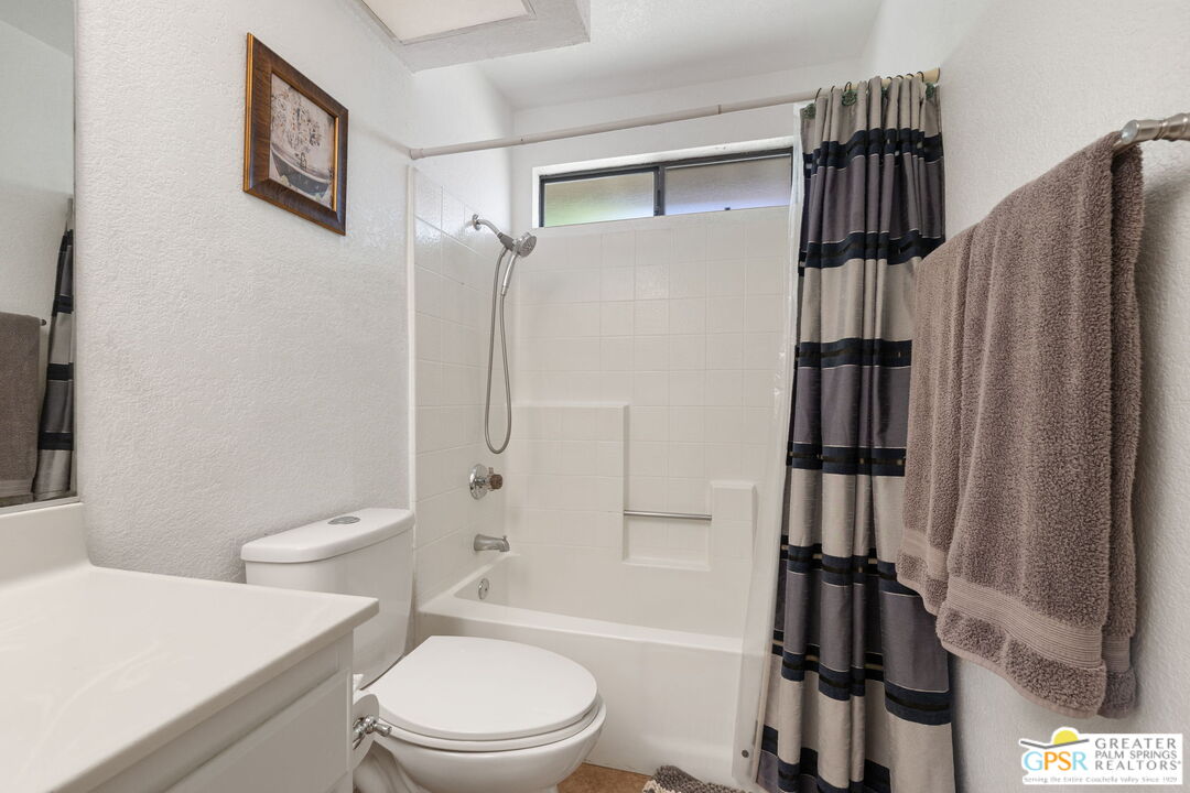 45688 Sutter Creek Road Indio, CA 92201 - Photo 35 of 51 a bathroom with a toilet a sink and bathtub