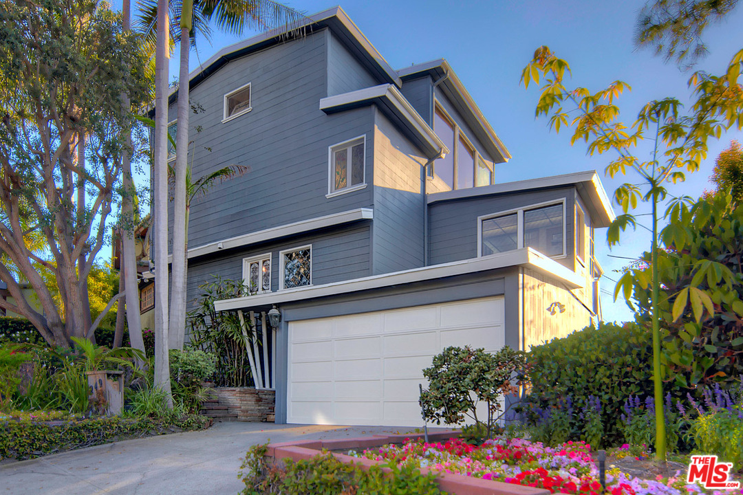 249 Fowling Street Playa del Rey, CA 90293 - Photo 1 of 40 a front view of a house with a yard