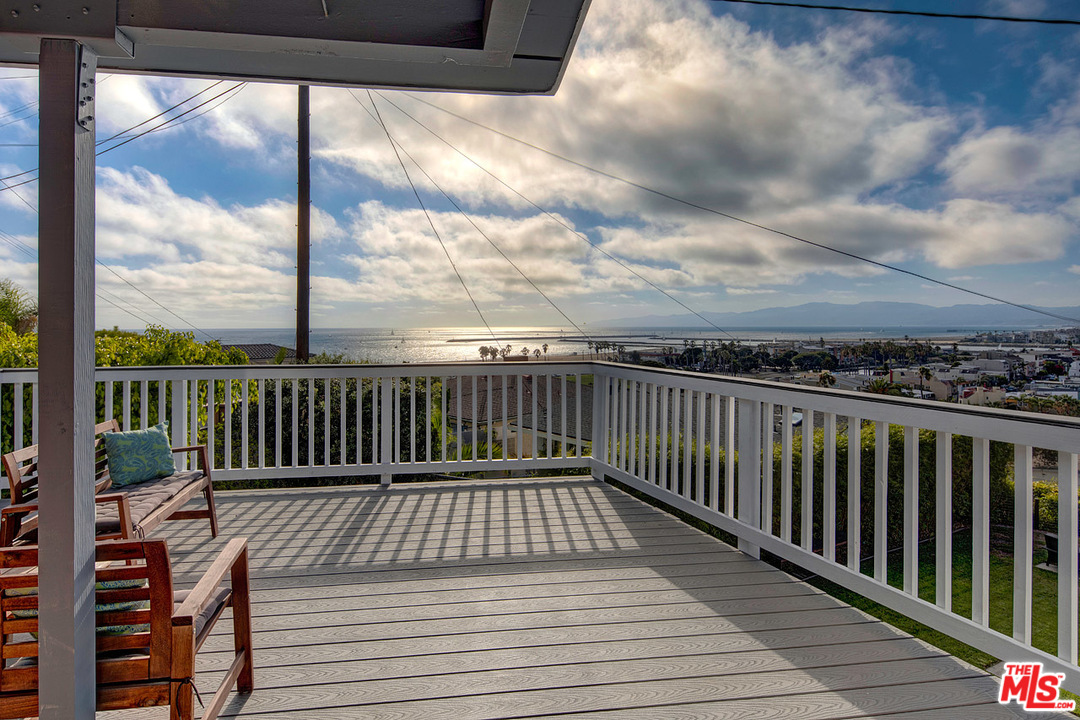 249 Fowling Street Playa del Rey, CA 90293 - Photo 3 of 40 a balcony with wooden floor