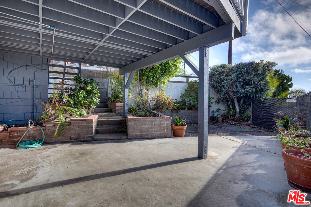 249 Fowling Street Playa del Rey, CA 90293 - Photo 31 of 40 a view of a porch with furniture and garden