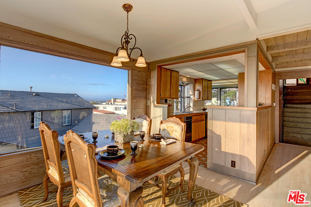 249 Fowling Street Playa del Rey, CA 90293 - Photo 6 of 40 a view of a dining room with furniture window and wooden floor