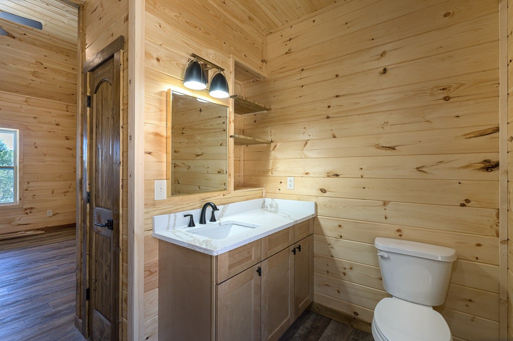 304 Old Evans Road Murphy, NC 28906 - Photo 17 of 31 a bathroom with a toilet sink and shower