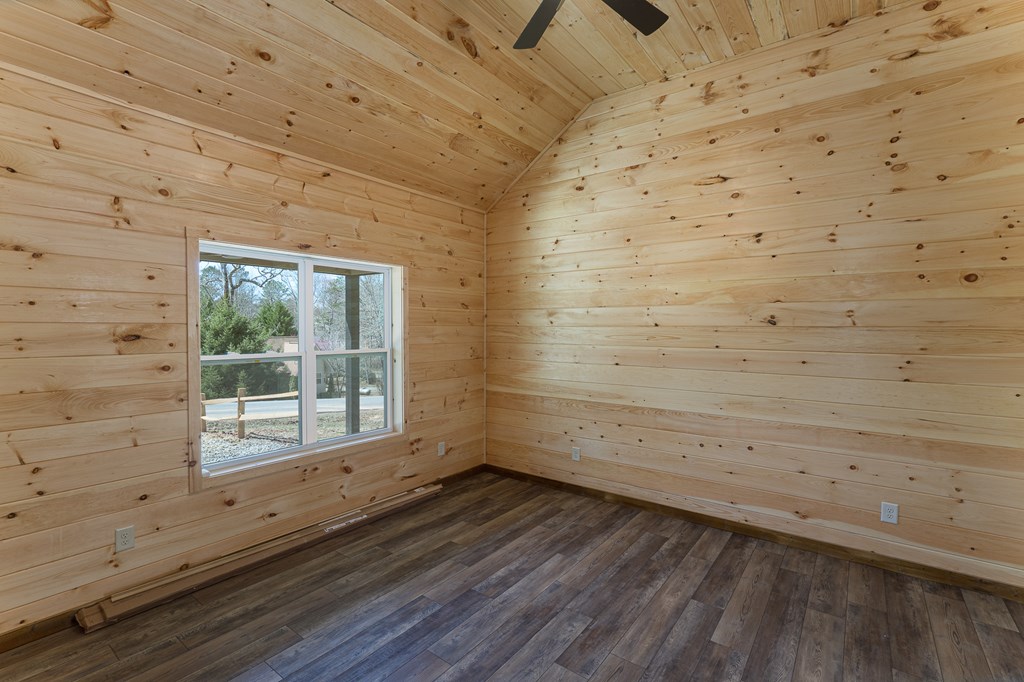304 Old Evans Road Murphy, NC 28906 - Photo 20 of 31 a view of empty room with wooden floor and windows