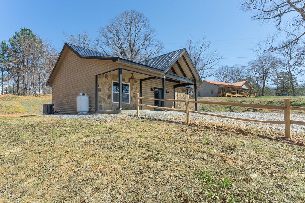 304 Old Evans Road Murphy, NC 28906 - Photo 2 of 31 a front view of a house with a yard