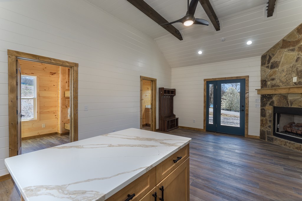 304 Old Evans Road Murphy, NC 28906 - Photo 23 of 31 a room with wooden floor and fireplace