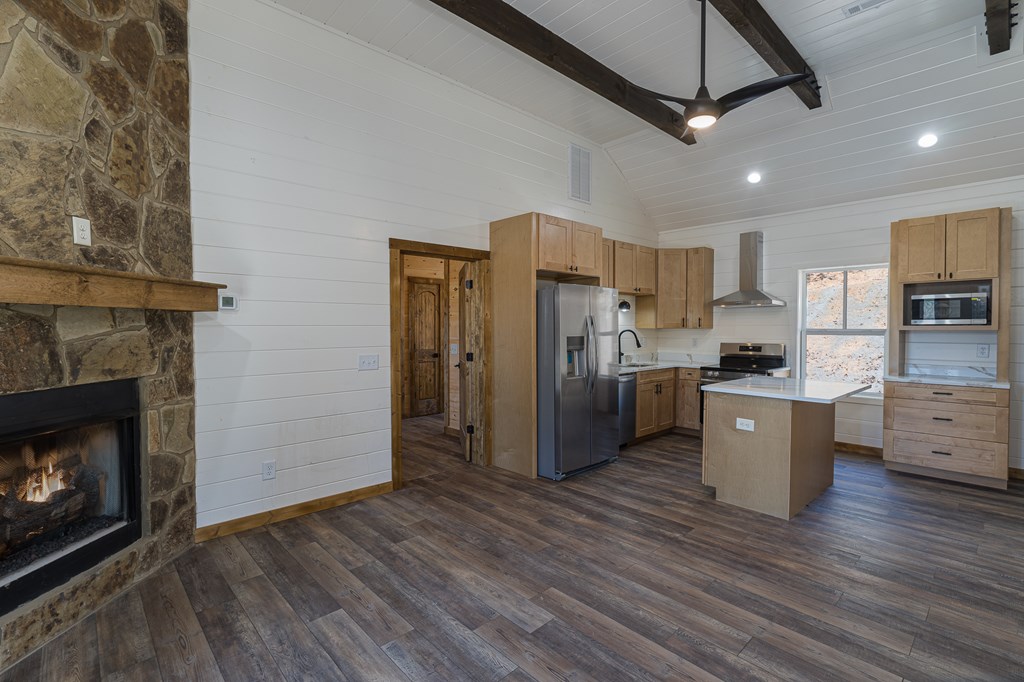 304 Old Evans Road Murphy, NC 28906 - Photo 27 of 31 a kitchen with stainless steel appliances a refrigerator a stove top oven a sink and dishwasher