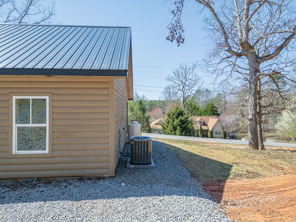 304 Old Evans Road Murphy, NC 28906 - Photo 6 of 31 a house view with a backyard