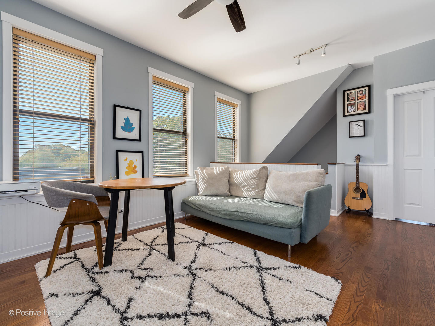 2075 North Oakley Avenue, Unit 3F Chicago, IL 60647 - Photo 17 of 24 a living room with furniture and a window