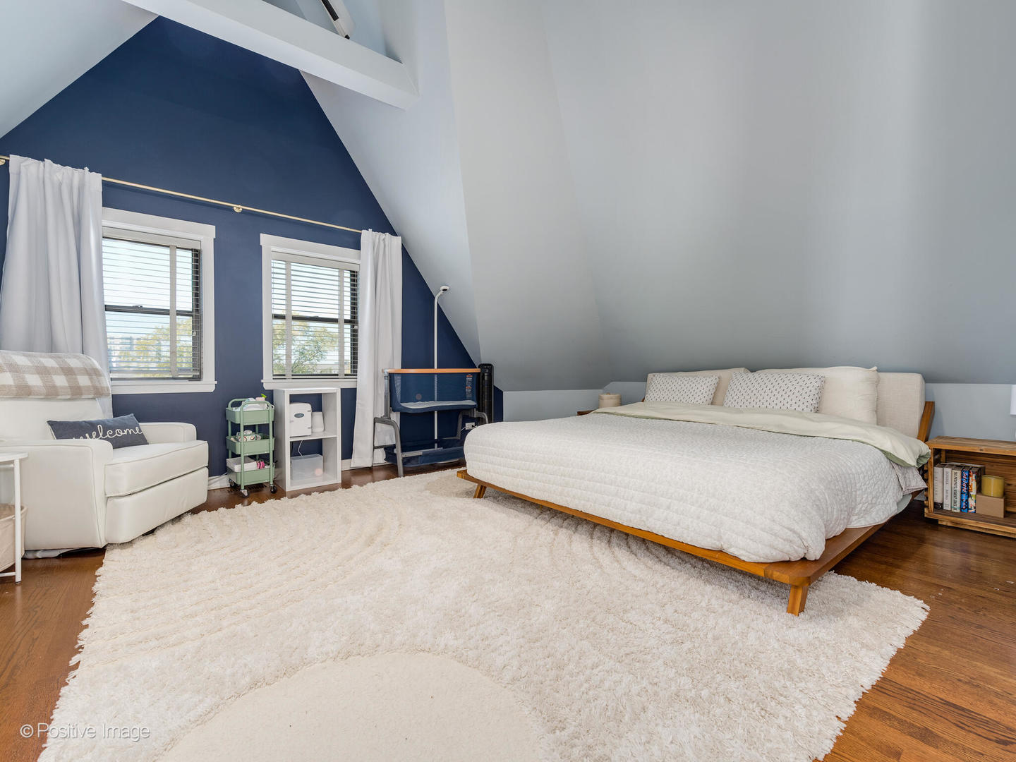 2075 North Oakley Avenue, Unit 3F Chicago, IL 60647 - Photo 20 of 24 a bedroom with a bed couch and window