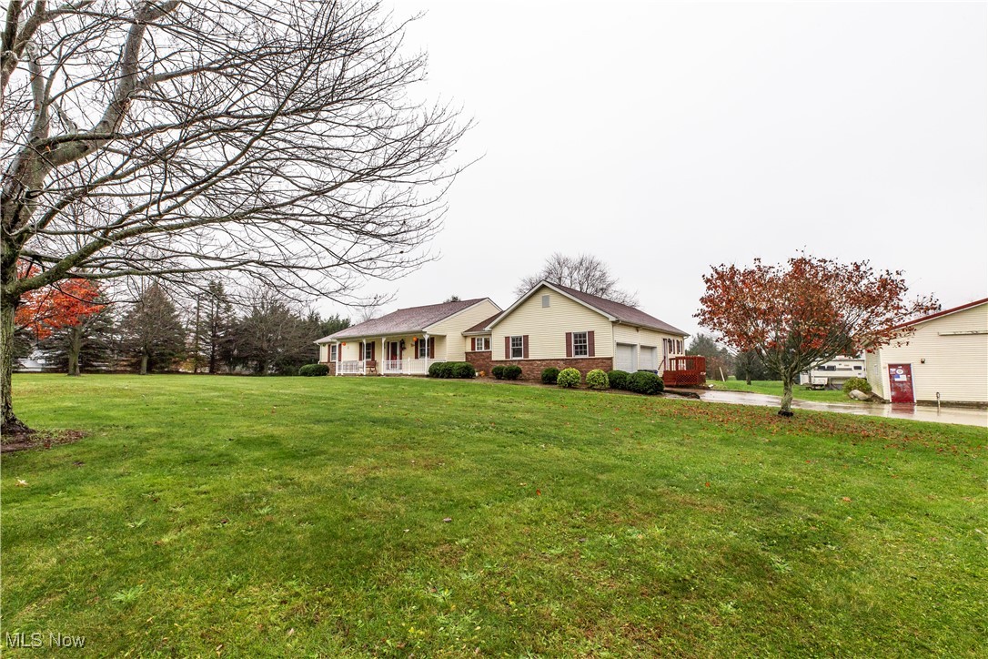3680 Work Road Ravenna, OH 44266 - Photo 8 of 19 View of front of property featuring a front yard and a porch