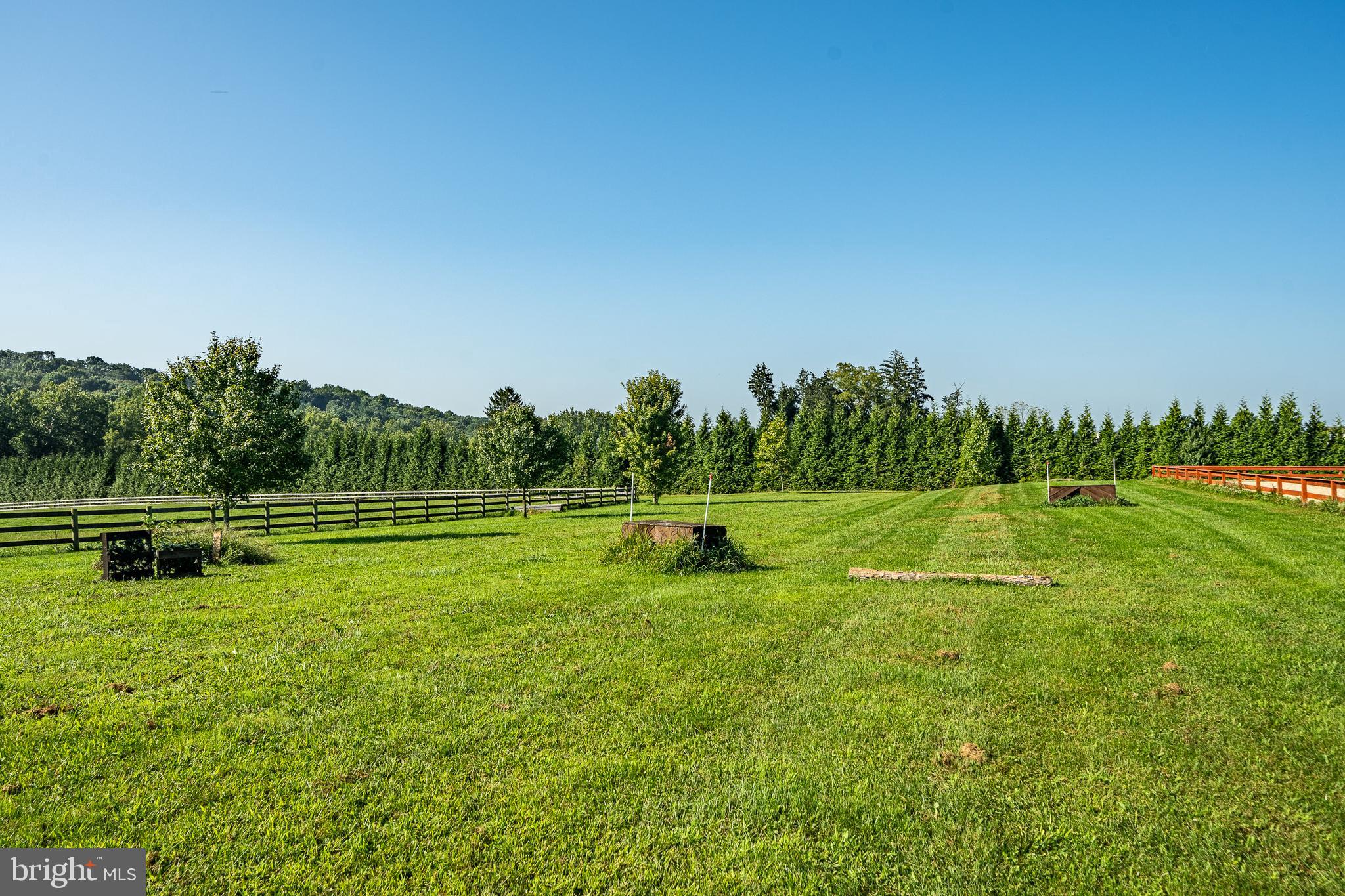 301 High Point Road Cochranville, PA 19330 - Photo 22 of 28 a view of a golf course with a lake