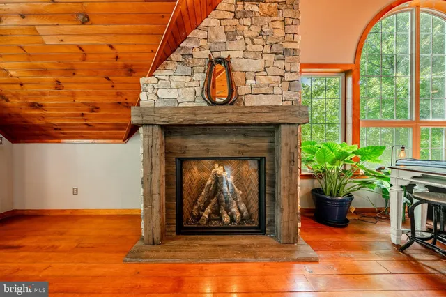a living room with a fireplace