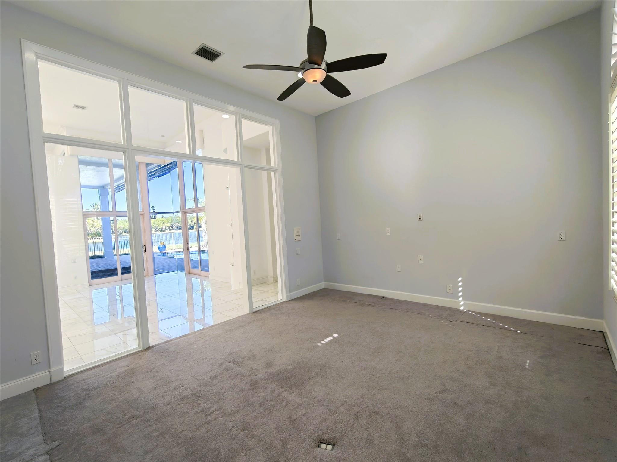 2939 Paddock Lane Weston, FL 33331 - Photo 14 of 86 a view of an empty room with a window