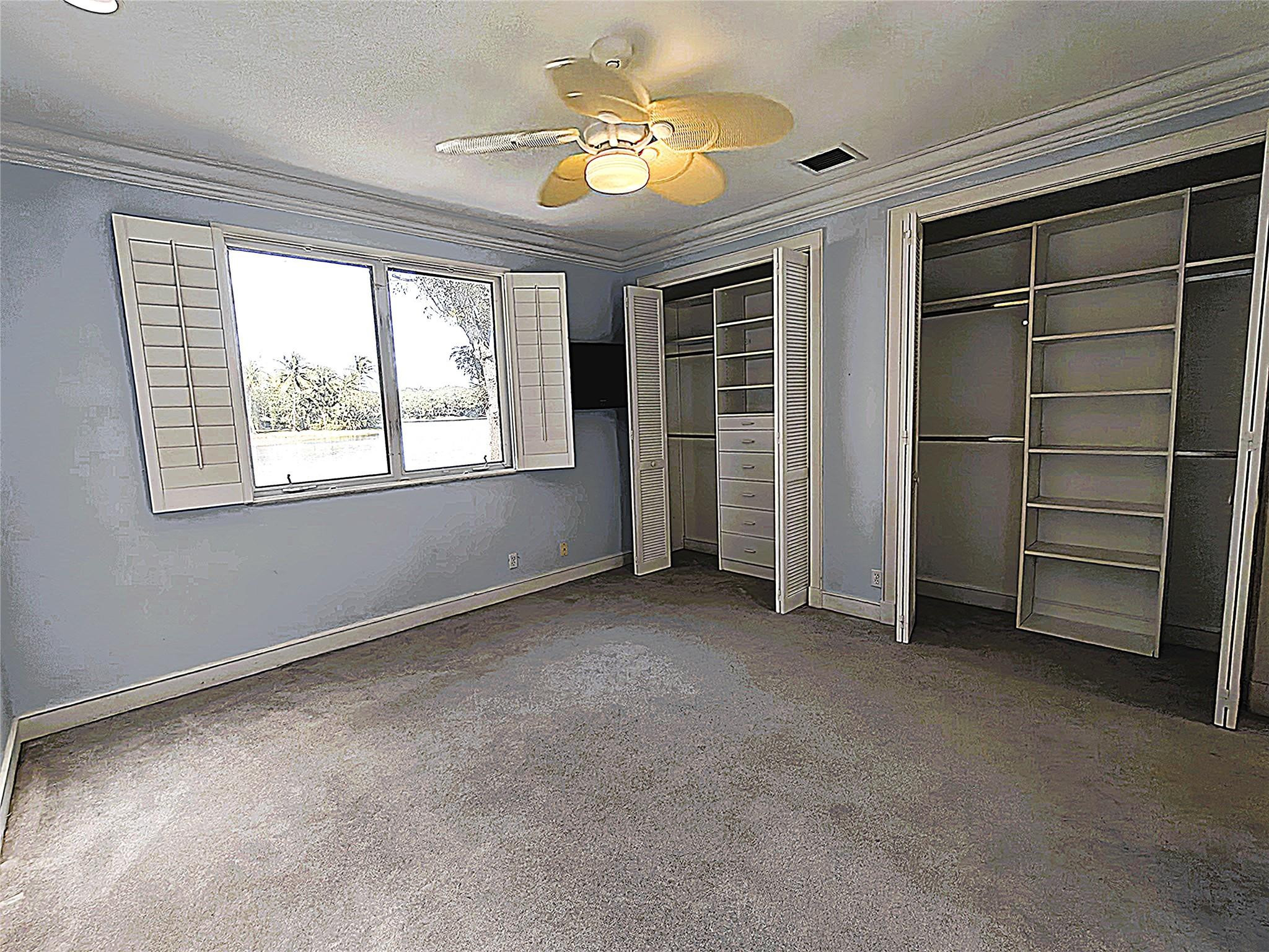 2939 Paddock Lane Weston, FL 33331 - Photo 51 of 86 an empty room with a window and a ceiling fan