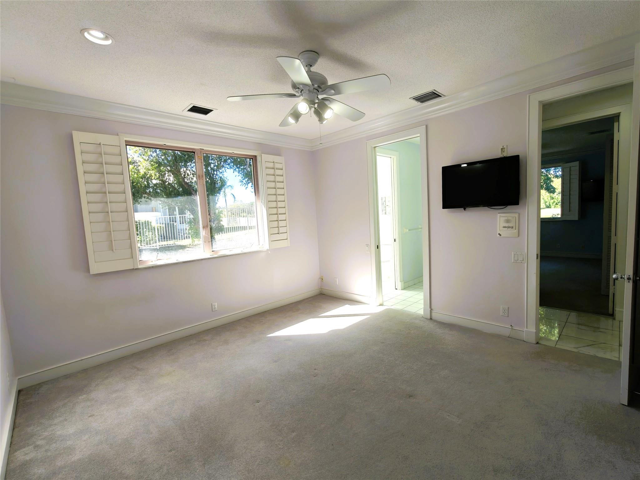 2939 Paddock Lane Weston, FL 33331 - Photo 59 of 86 a view of an empty room with a window
