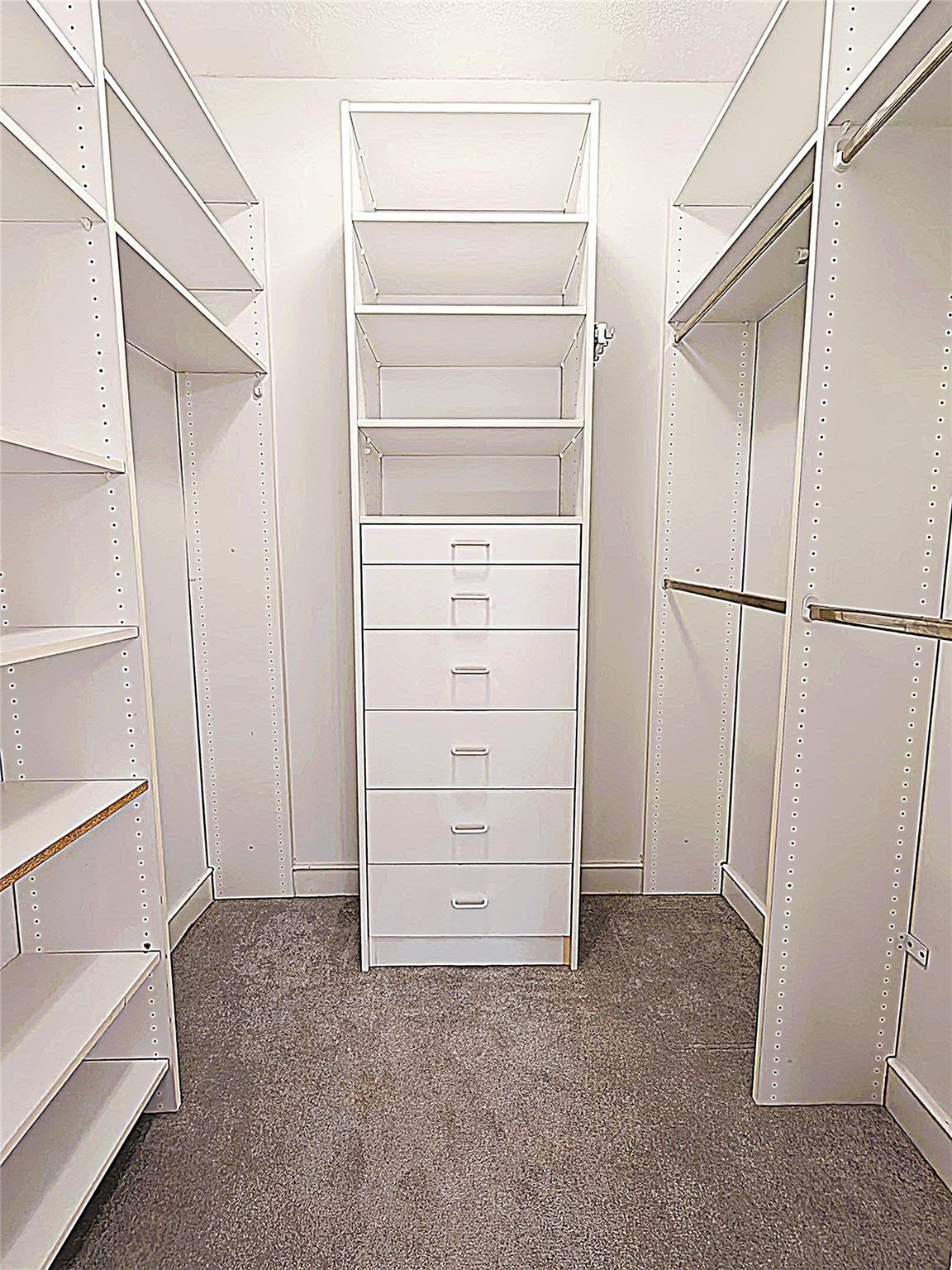 2939 Paddock Lane Weston, FL 33331 - Photo 61 of 86 a view of walk in closet with empty racks