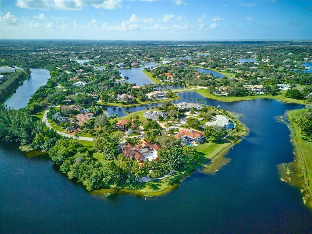 2939 Paddock Lane Weston, FL 33331 - Photo 85 of 86 an aerial view of residential houses with outdoor space and lake view