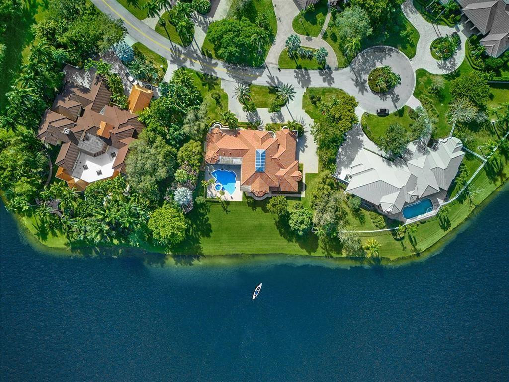 2939 Paddock Lane Weston, FL 33331 - Photo 86 of 86 an aerial view of a house with garden space and street view