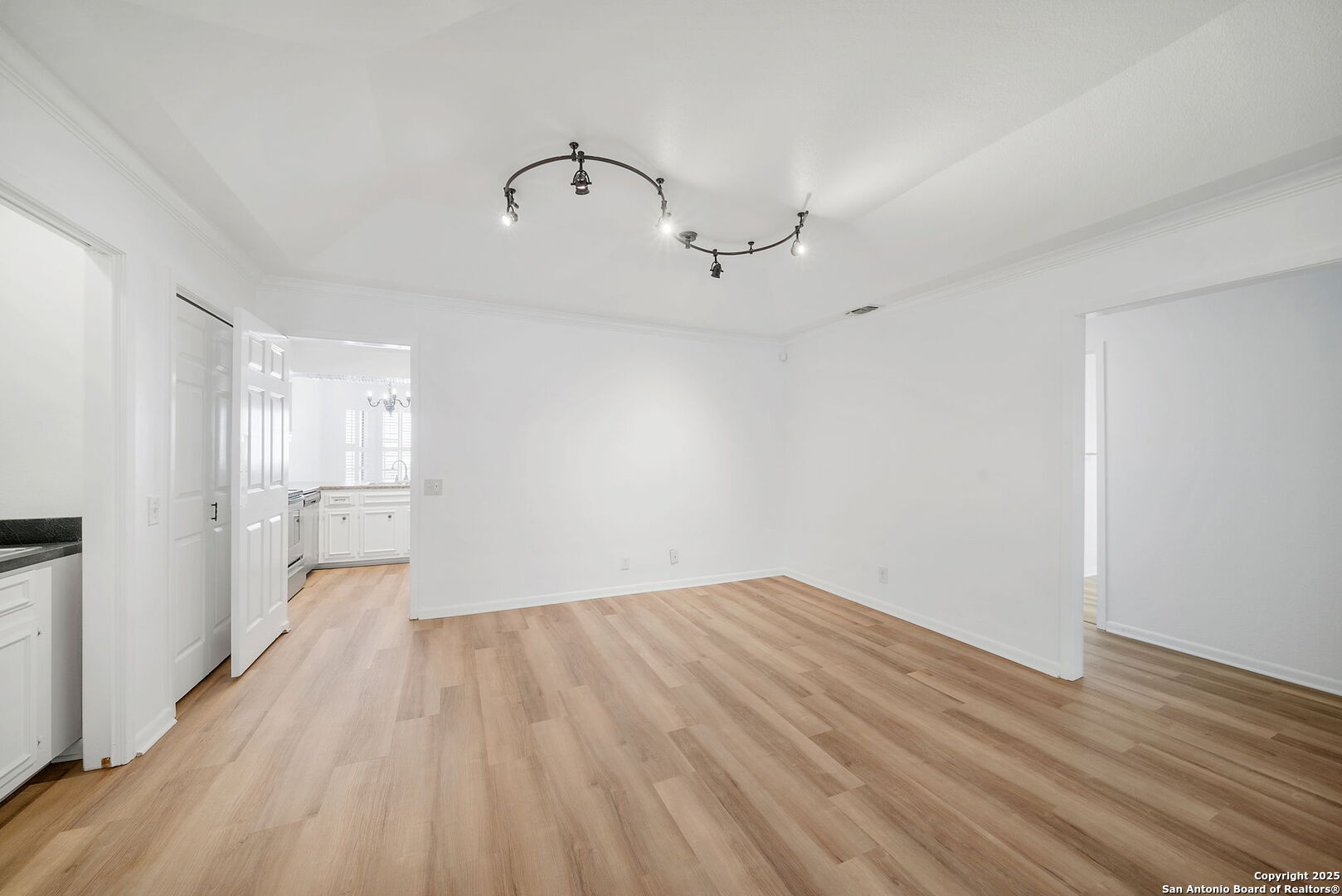8415 Fredericksburg Road, Unit 704 San Antonio, TX 78229 - Photo 13 of 30 a view of empty room with wooden floor