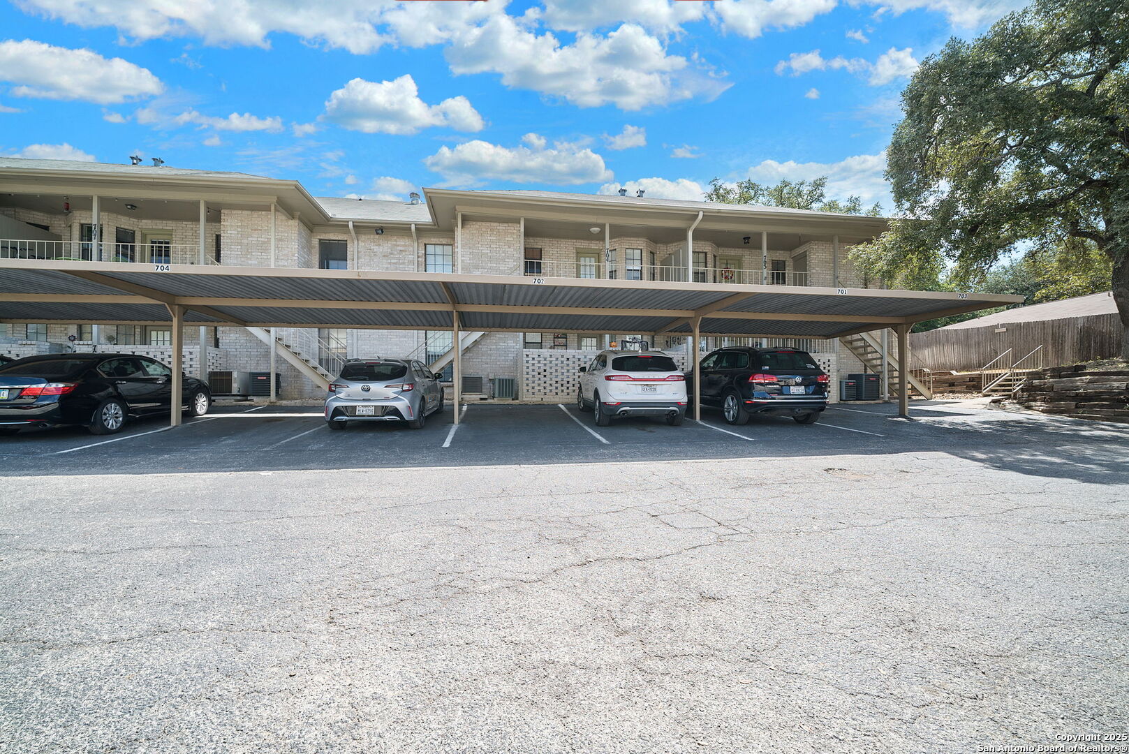 8415 Fredericksburg Road, Unit 704 San Antonio, TX 78229 - Photo 30 of 30 a car parked in front of a building