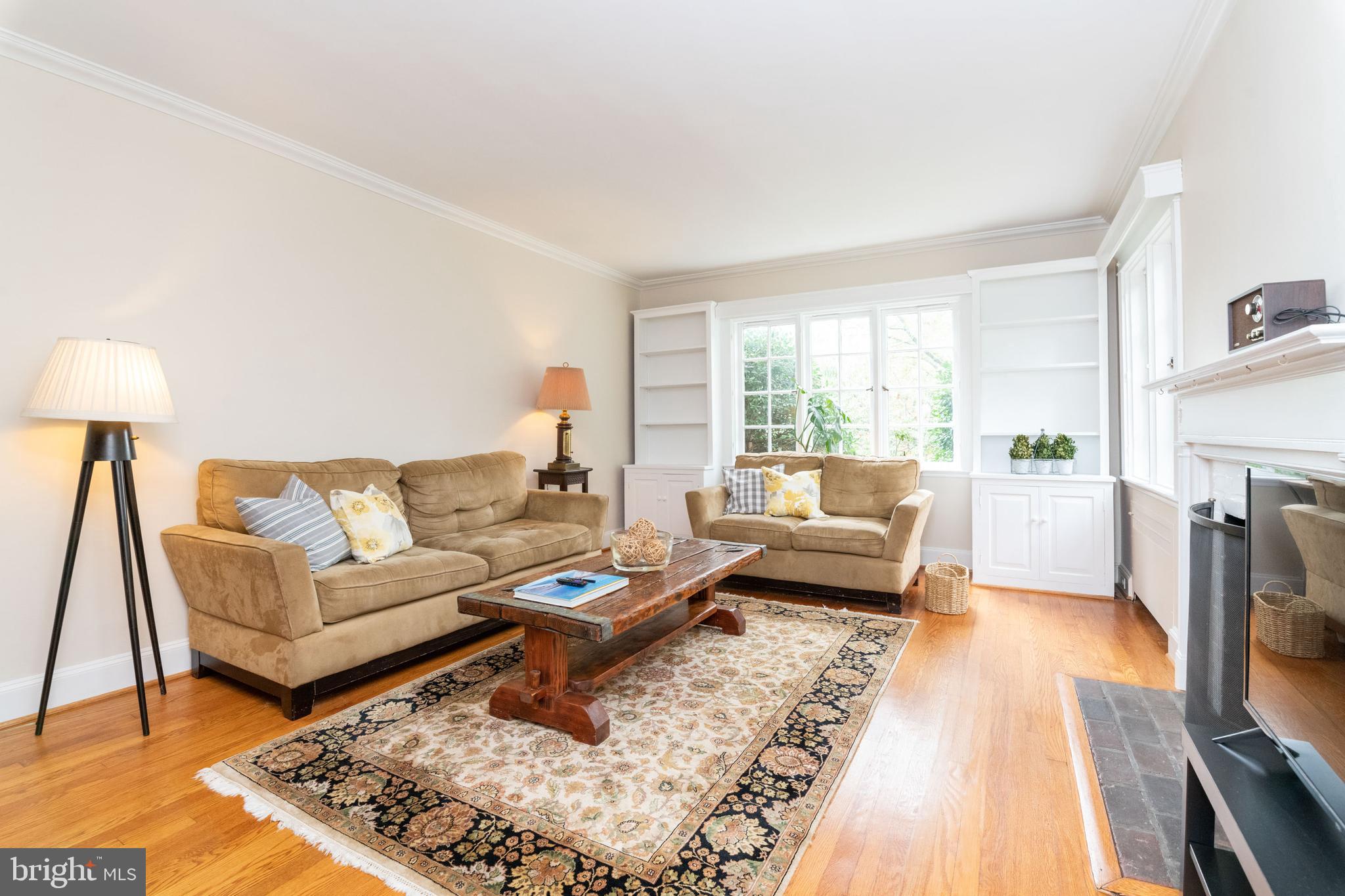 4123 Westview Road Baltimore, MD 21218 - Photo 6 of 39 LIVING ROOM WITH BUILT IN BOOKCASES