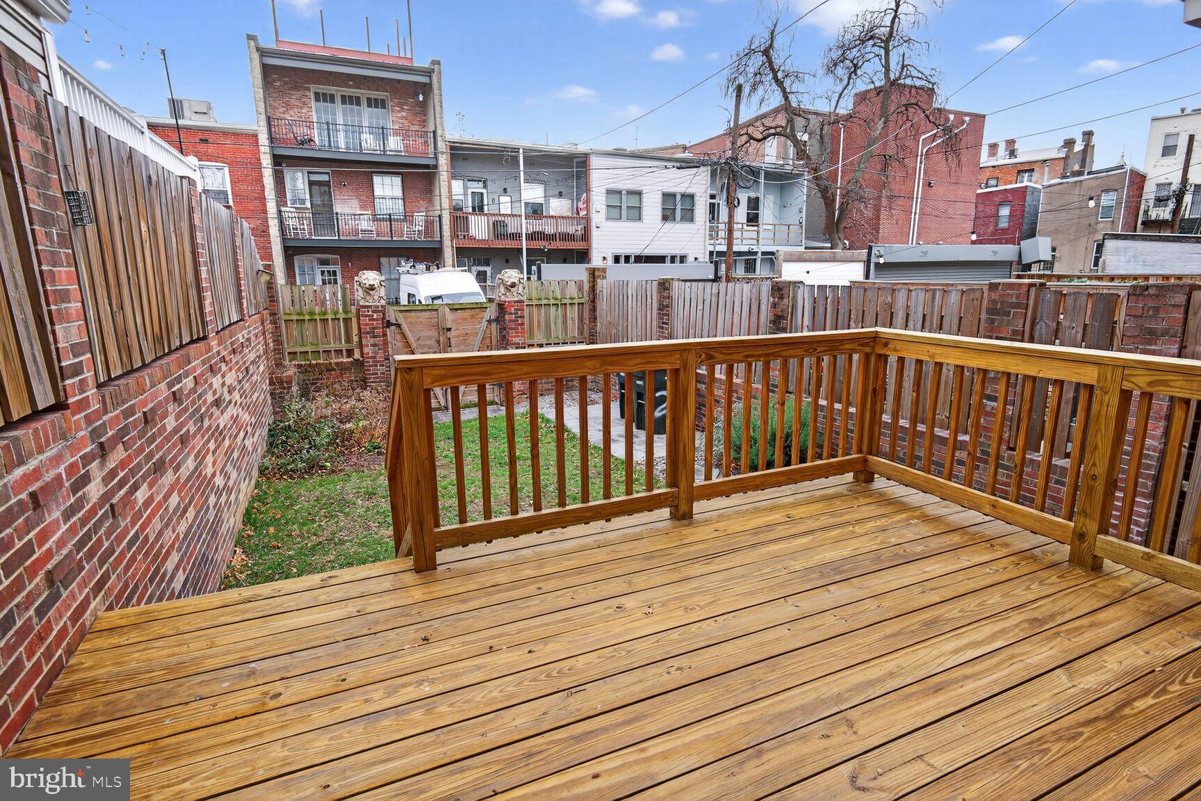 216 N Street Northwest Washington, DC 20001 - Photo 13 of 30 a balcony with wooden floor