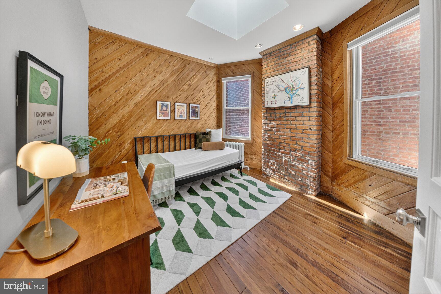 216 N Street Northwest Washington, DC 20001 - Photo 25 of 30 a living room with furniture and a gate
