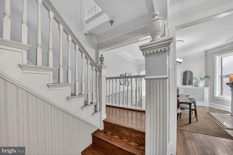 a bathroom with a sink toilet and mirror