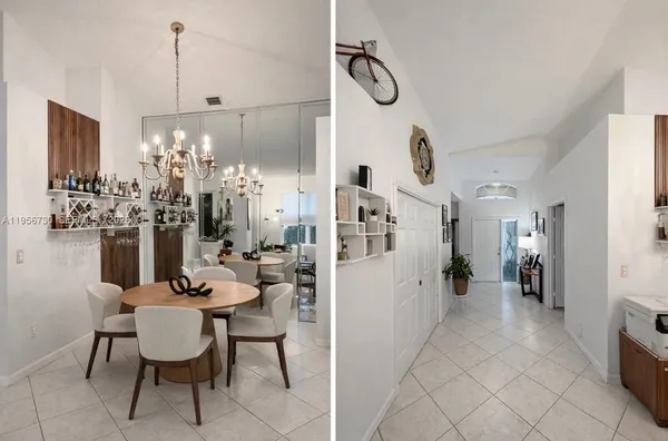 a kitchen with stainless steel appliances granite countertop a sink refrigerator and cabinets